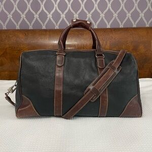 ROOTS Black and Brown Leather Duffel Bag